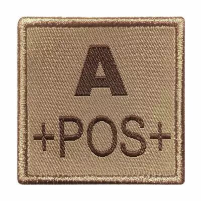 Insigne de Groupe Sanguin Beige Brodure Marron A+POS+